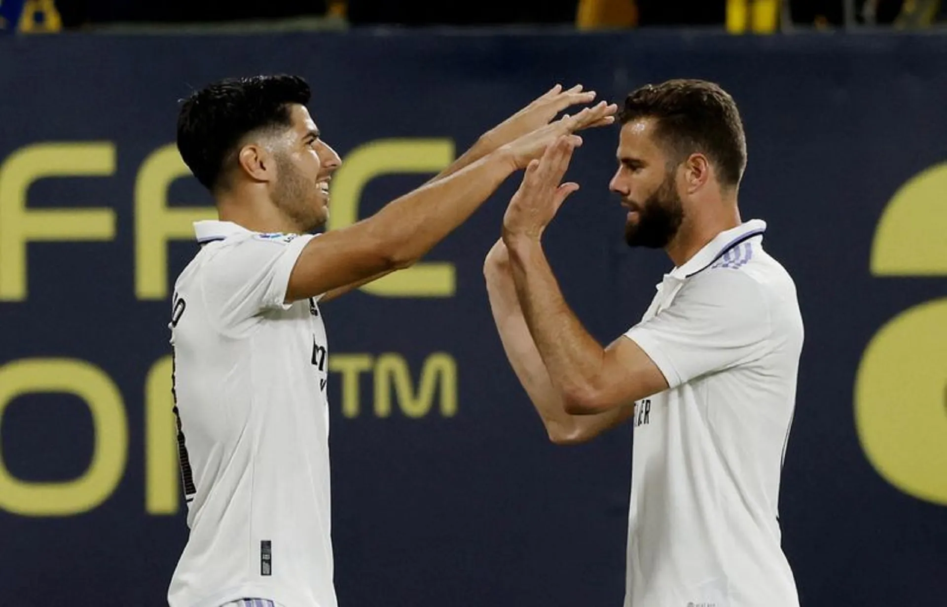 Nacho and Asensio score late to give Real Madrid 2-0 win at Cadiz