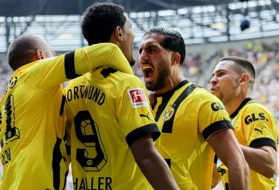 Dortmund one win from Bundesliga title as Haller double defeats Augsburg