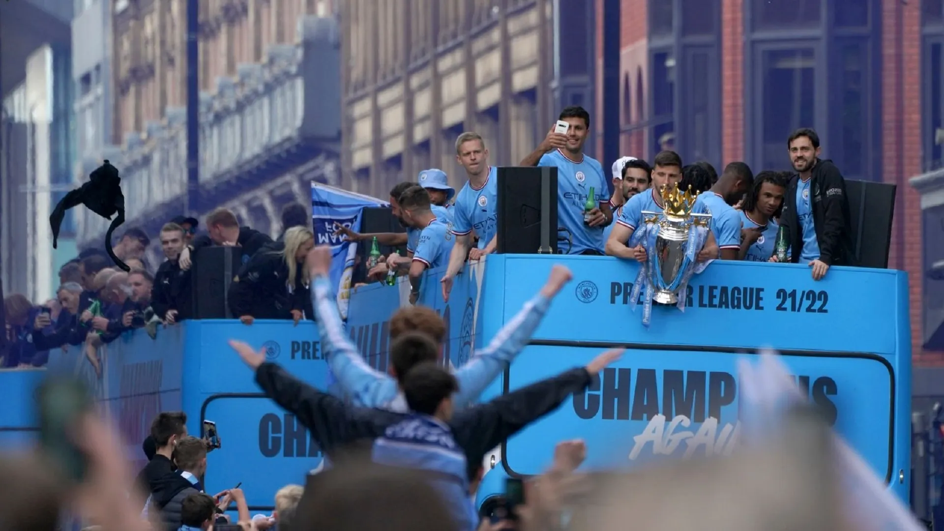 Manchester City dance in the rain to celebrate treble