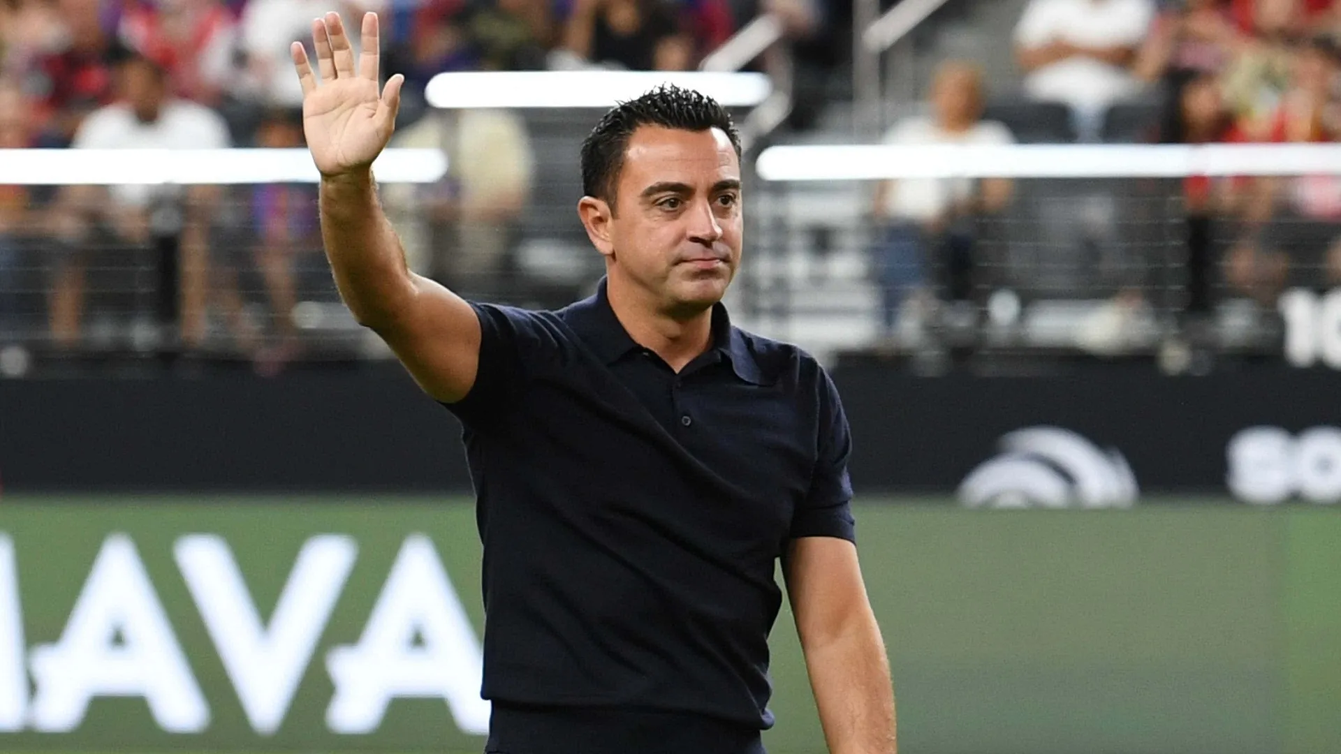 It's official! Barcelona lock Xavi down with new two-year contract extension