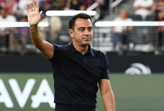 It's official! Barcelona lock Xavi down with new two-year contract extension